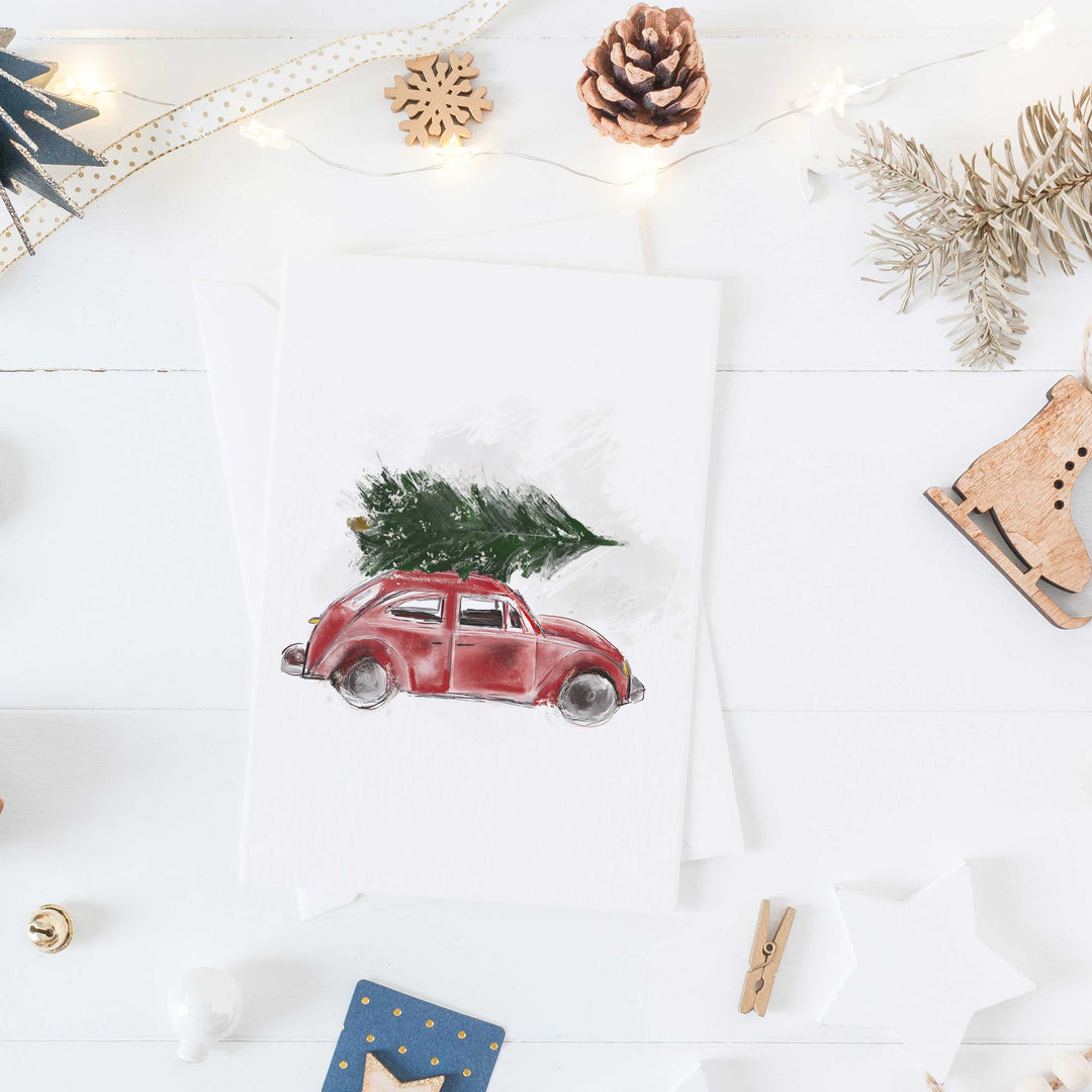 Carte de Noël - voiture rouge et son sapin